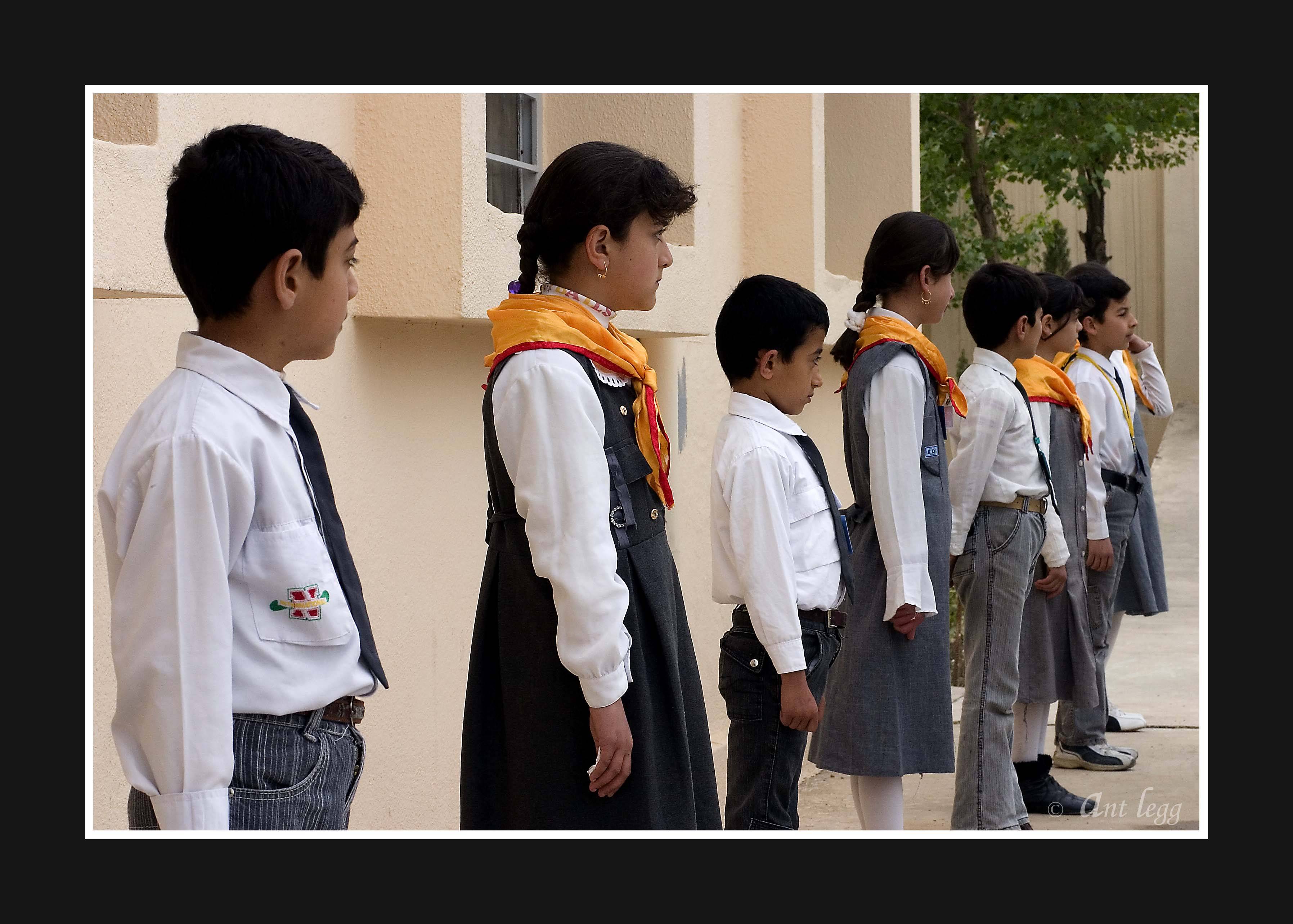 students form an honour guard