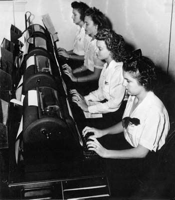 1940s - Miss Lutrelle Conger and co-workers on teletype machines at Pan American Airways System in Miami