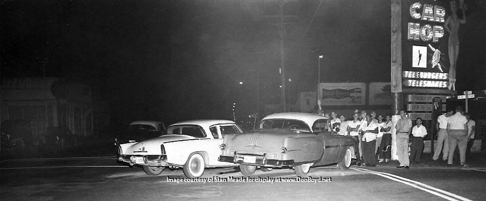 1950s - a 1956 Studebaker Hawk in a minor car wreck in front of the Car Hop Drive-In featuring Teleburgers and Teleshakes