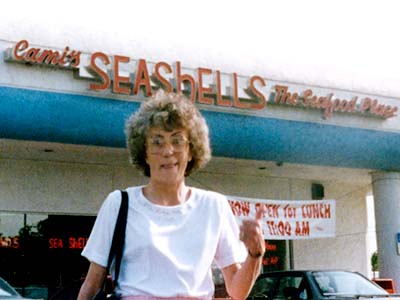 Elizabeth Liz Kettleman in front of her favorite restaurant, Camis Seafood Restaurant