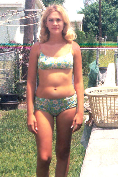 Mid 1960s - Jacqueline Jackie Zimmerman in her familys backyard next to the pool
