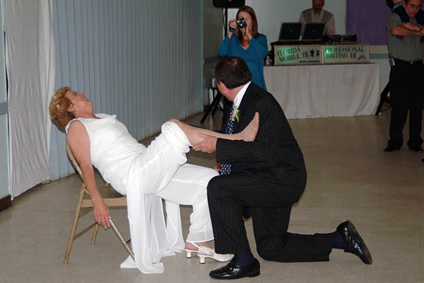 Pete removing Lindas garter, photo #9065