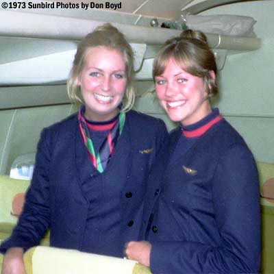 1973 - pretty United Airlines flight attendants Pat Ban and Denise Bentzinger onboard a United B727 at MIA