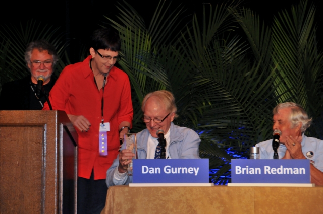 Editor Jean Jennings presents an Automobile Magazine Award to Dan Gurney. (9130)