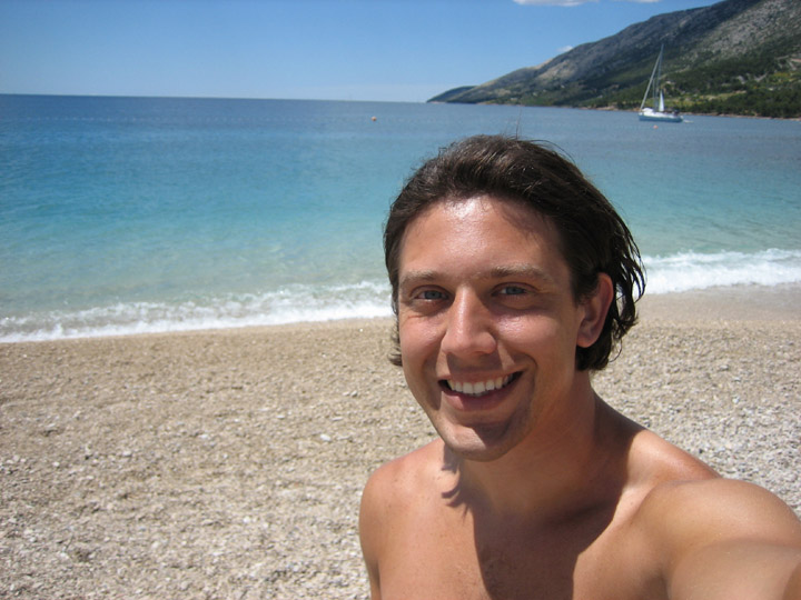 zach at the beach in bol