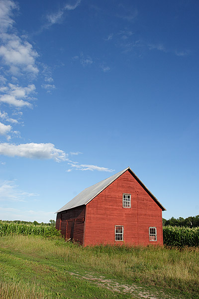 red barn on a summer evening