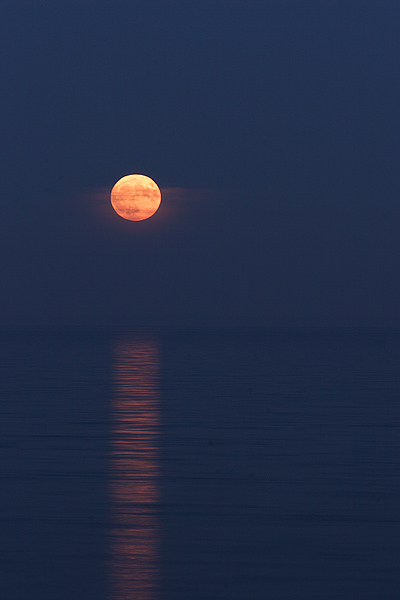 moon over blue water