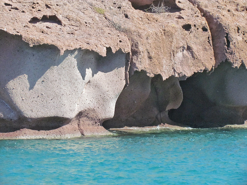Eroded Rock Overhanging the Water (3100X)