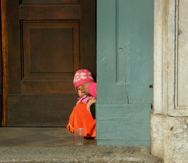 Before the door of a church