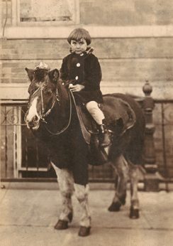 Hilda (Richards mother) on a pony. She told Richard she was scared when she got on the pony. (circa 1920)