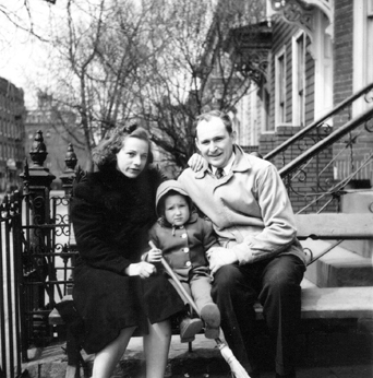 Aunt Thelma and uncle Morris (mother's brother) with Phyllis at grandparents' house on St. Marks Ave., Brooklyn (early 1940's)