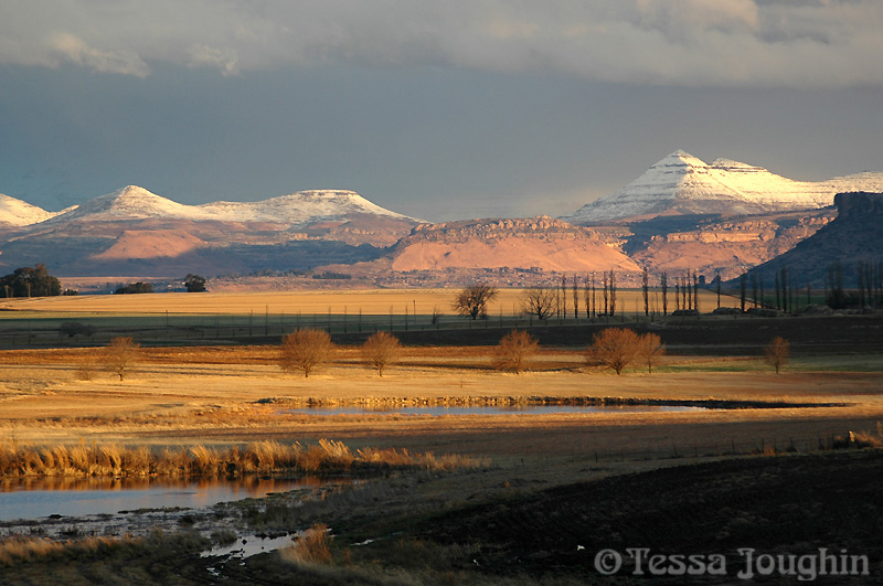 Sunset, dams and snow over Sandstone Estates