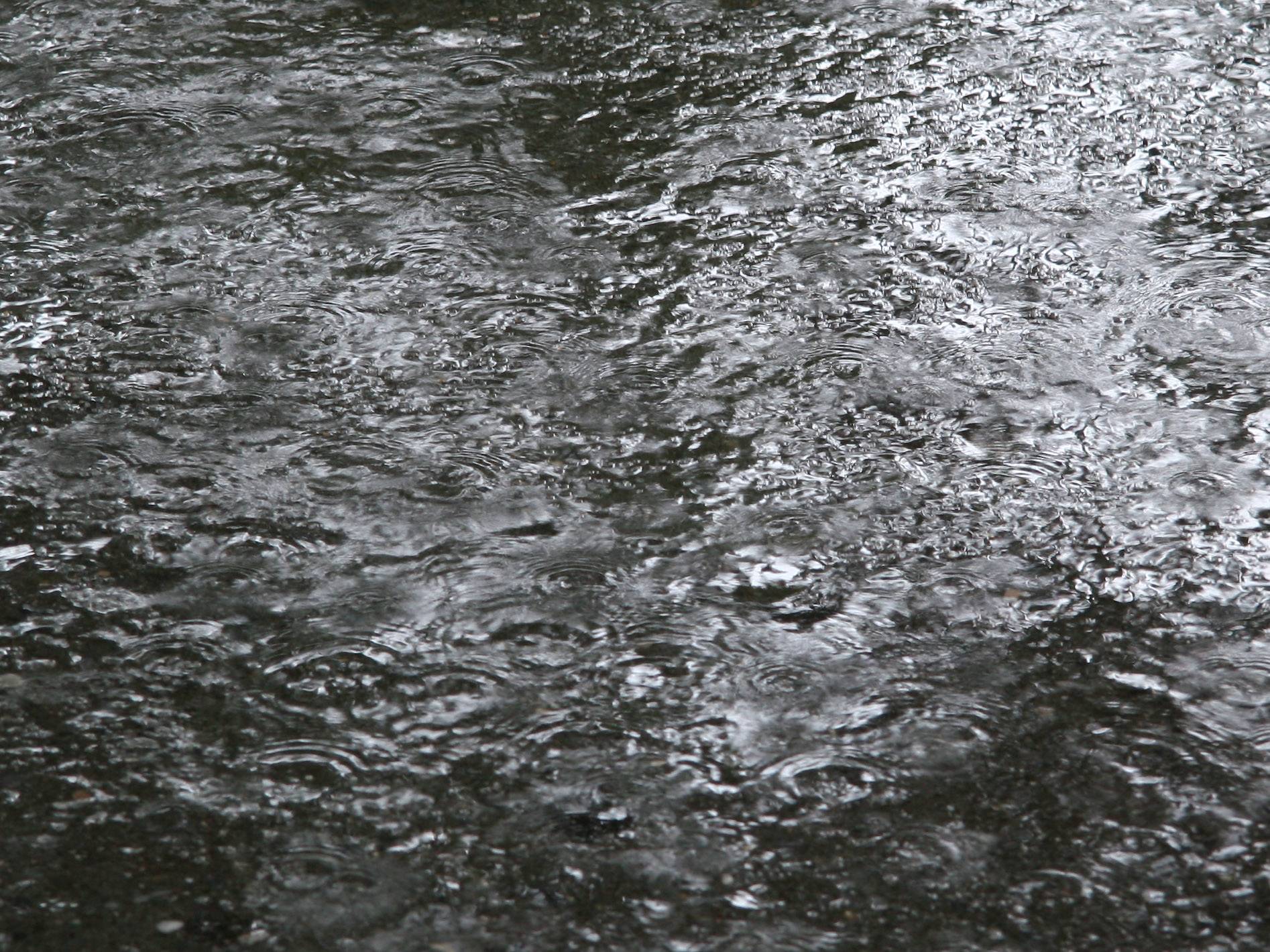 Sprinkling Water on the Sidewalk