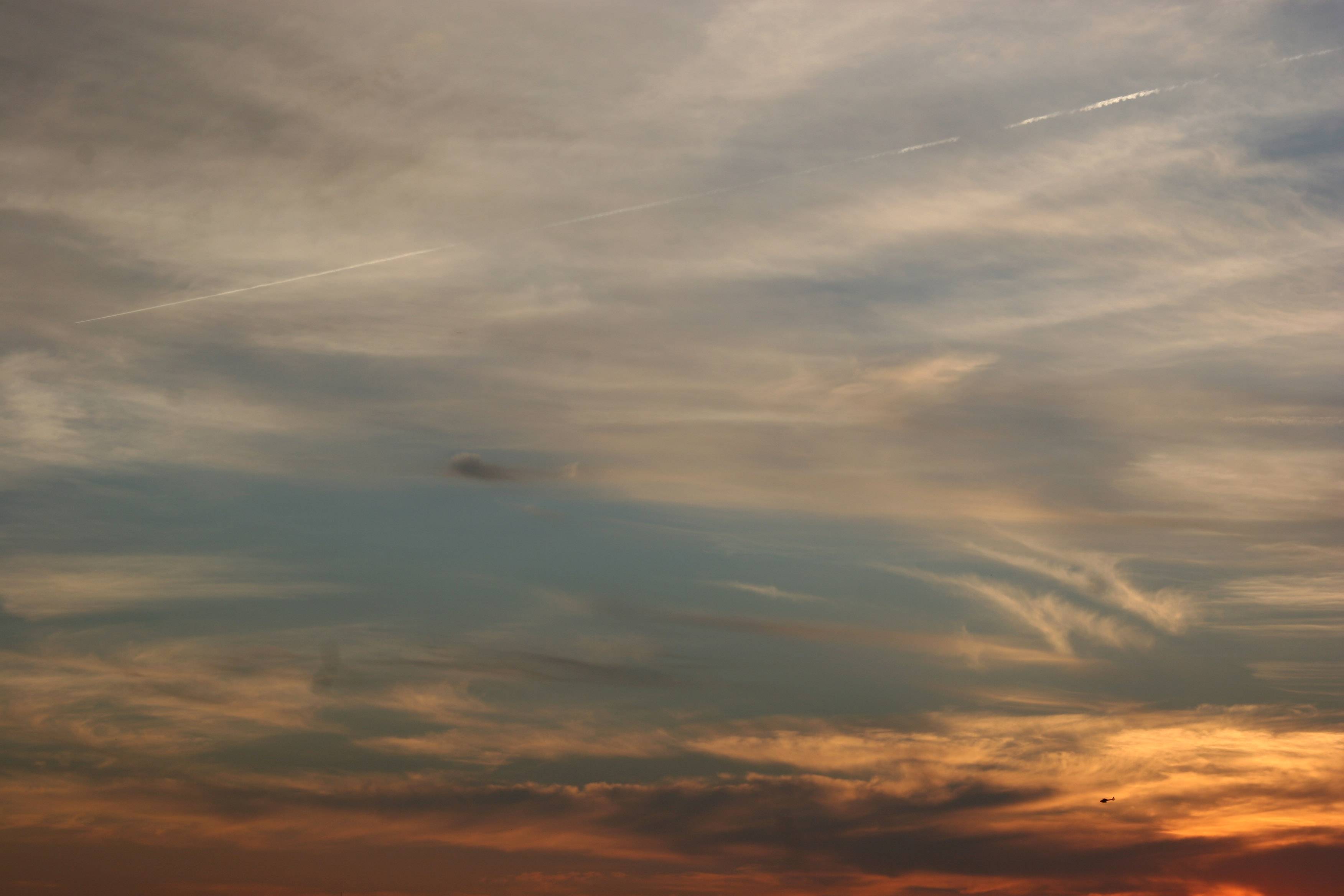 Flying through a Sunset