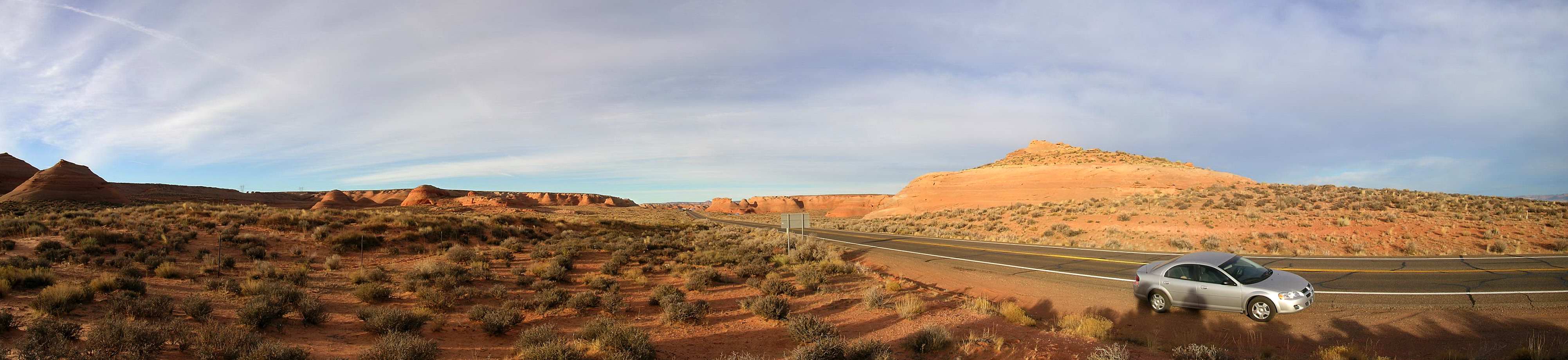 Car and hill on the way to Monument Valley - 27th
