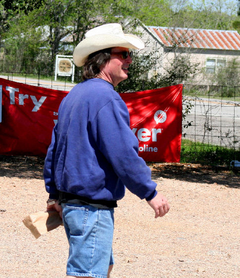 COWBOY WEARING SHORTS