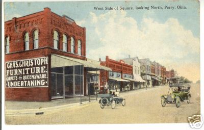 OK Perry West Side of Square looking North 1916 postmark.jpg