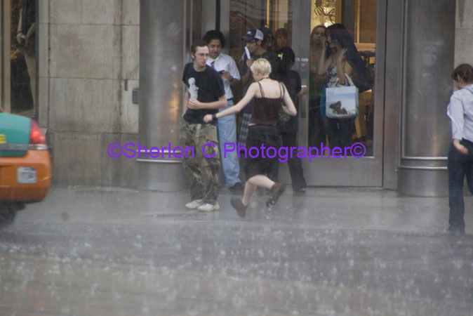 IMGP0625  YD Square Singing in the Rain.jpg