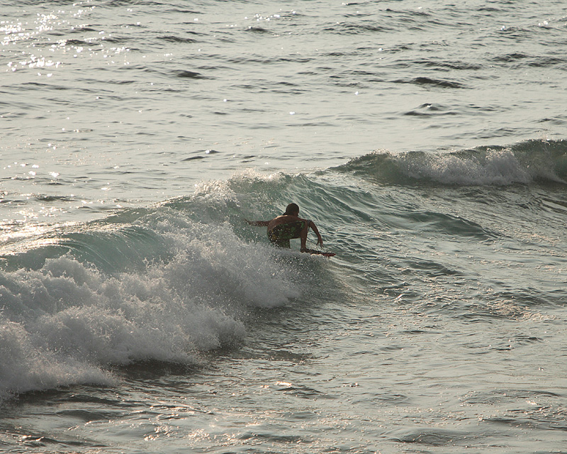 Surfing kid at the local hangout.