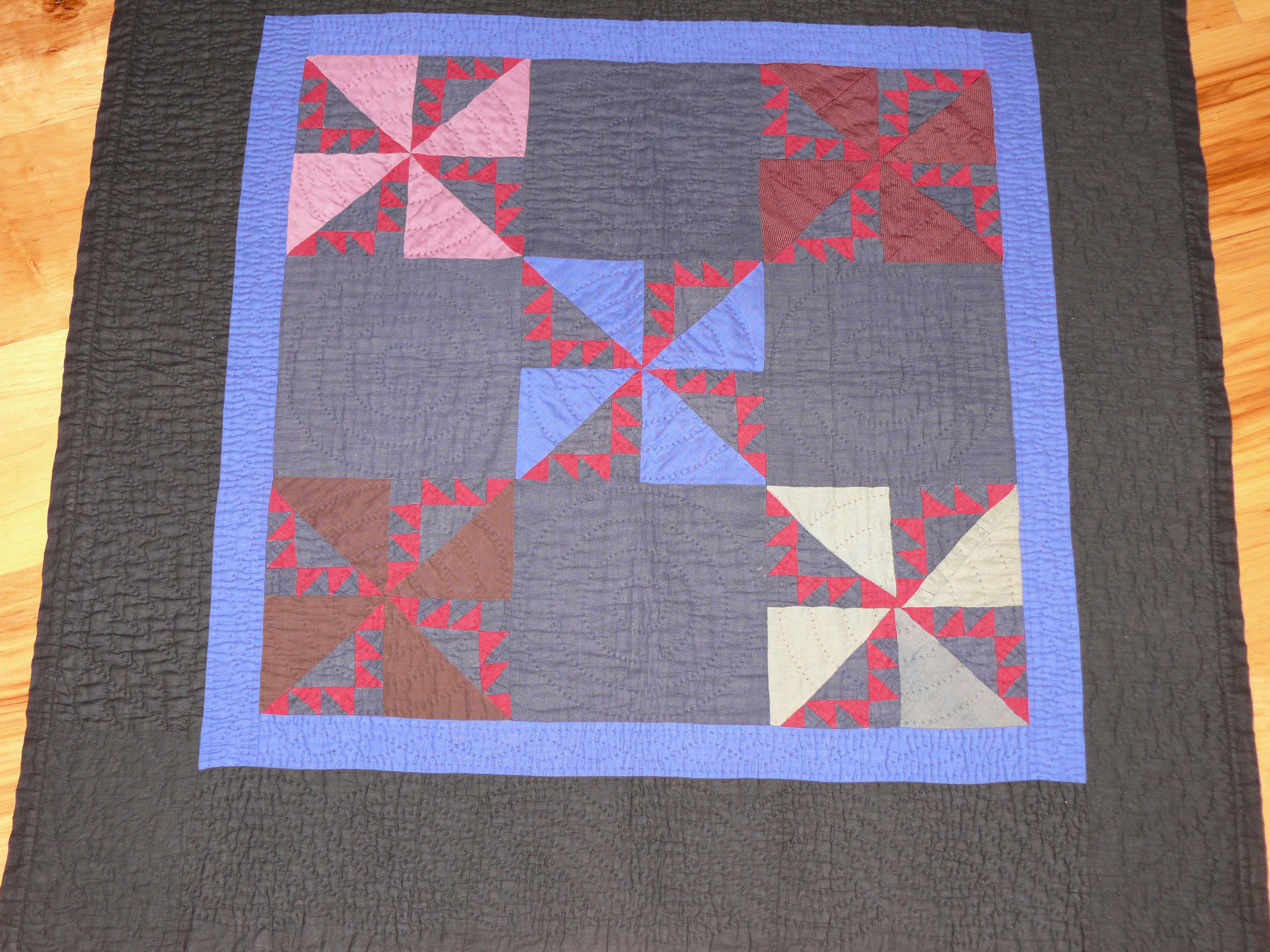 107: Pinwheel crib quilt, Holmes County, OH c. 1930 31x31
