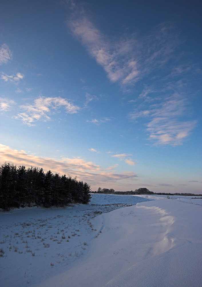 Snowy valley and sky