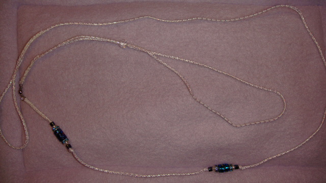 White Irridenscent cord with 2 clusters