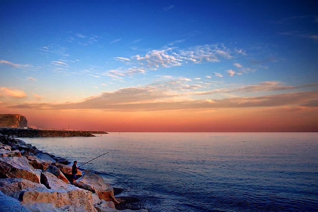 Sunset fisherman, West Bay