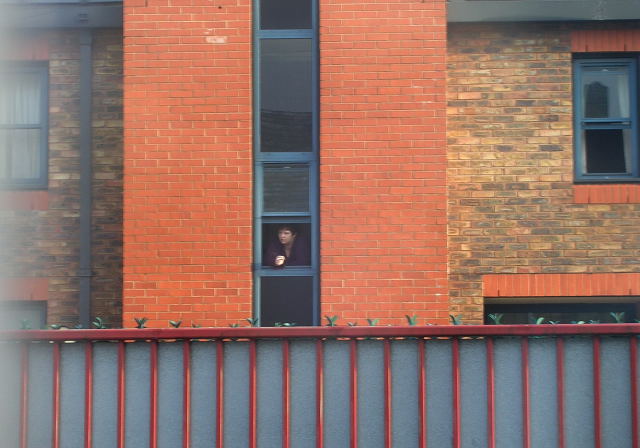 Barracks smokers hung out this window and usually watched us.