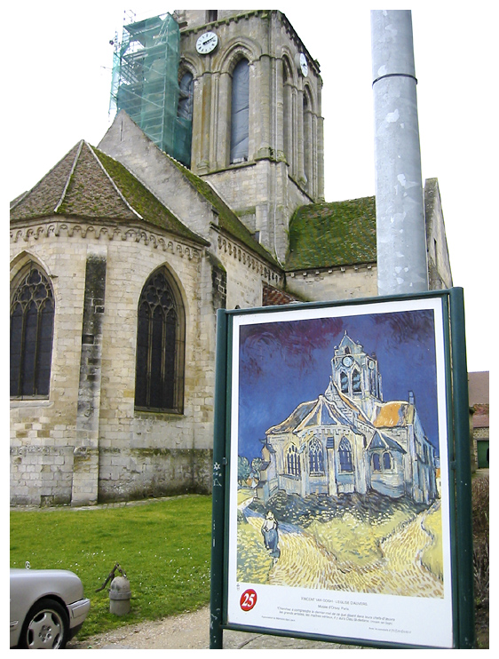 church near grave yard.  Auvers-sur-Oise, France