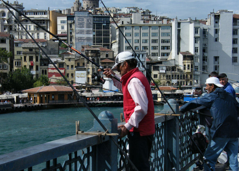  Fishermen on Galata Bridge. They seemed to catch a lot of sardine sized fish.