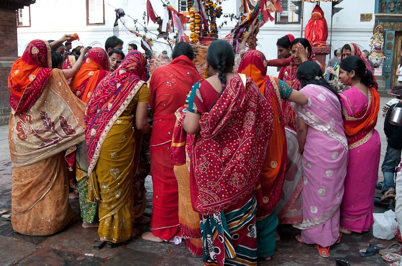 Women making offerings at a festival in Kathmandu