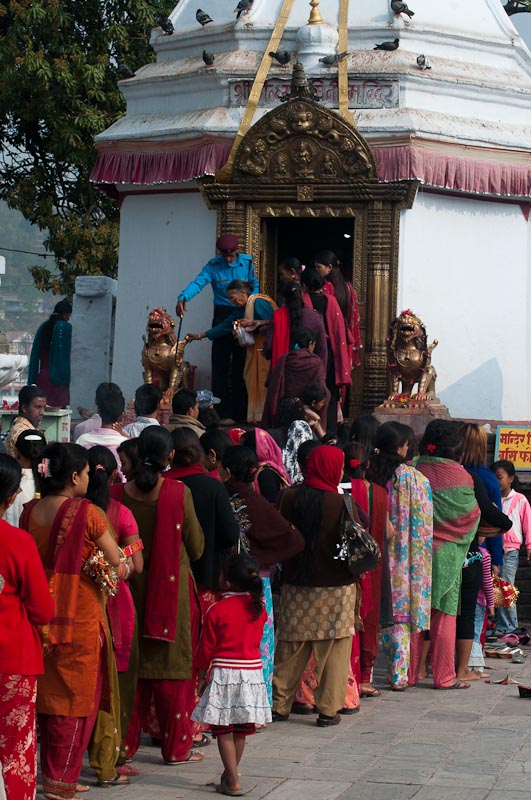 Holi worshippers queueing at the temple