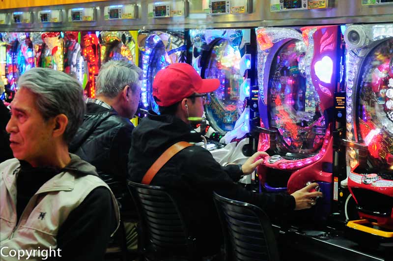 Tokyo men glued to gaming machines