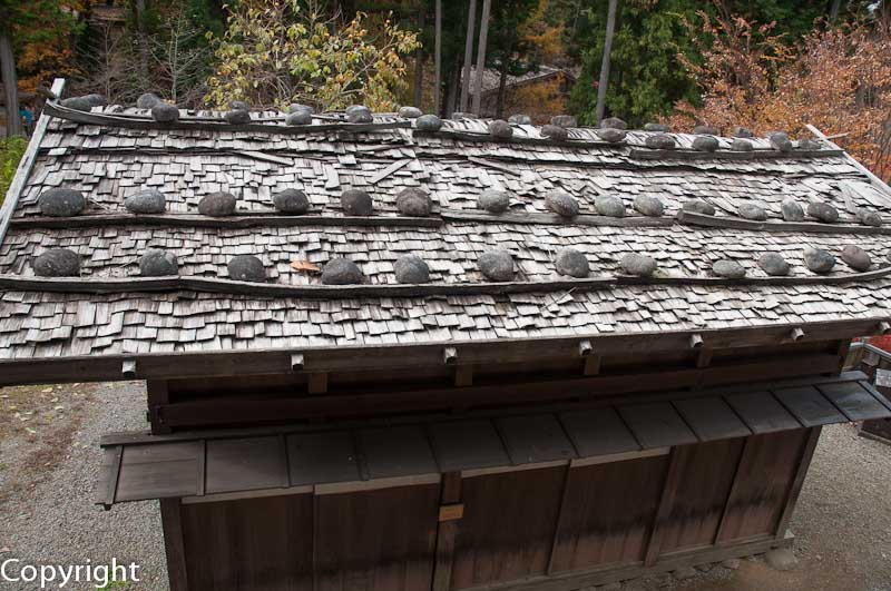 Roof weighed down with stone