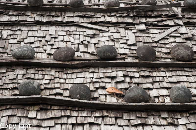 Roof weighed down with stones