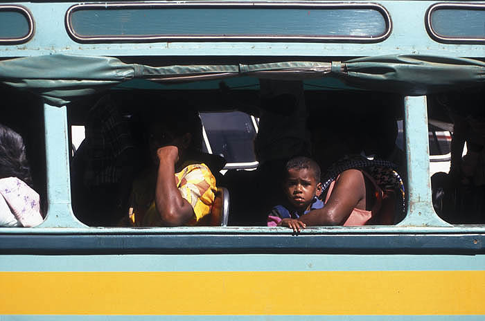 Passengers on a Fijian bus