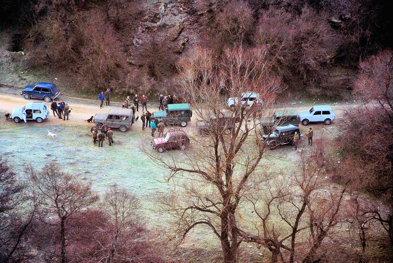 The hunters gathered at the bottom of the forest....