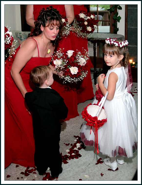 Bridesmaid Tends to Ring Barer