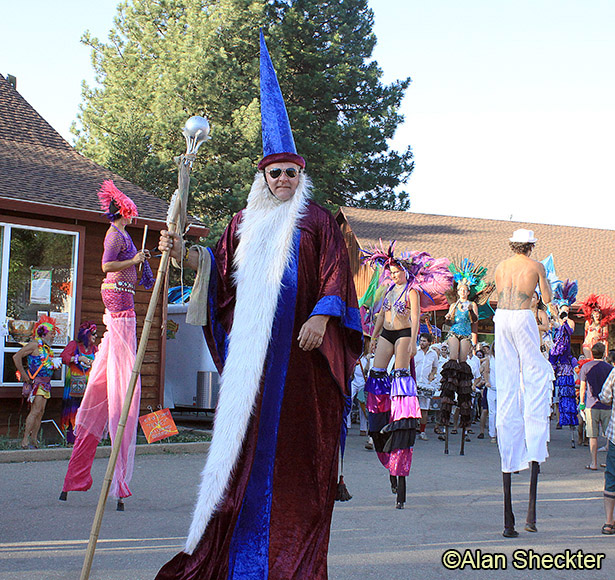 Festival parade, featuring the Samba Stilt Circus, Third Planet Ceremonial puppets and Chicos Wolfthump