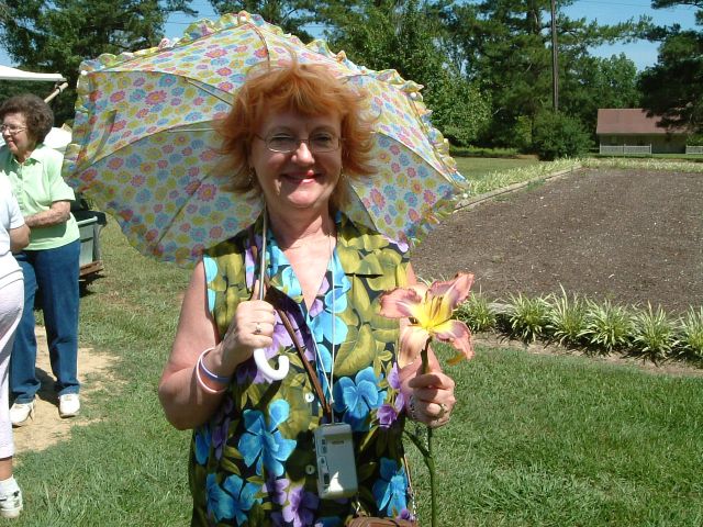 Kathy with the daylily she bought
