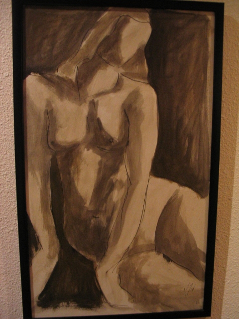 MUJER SENTADA