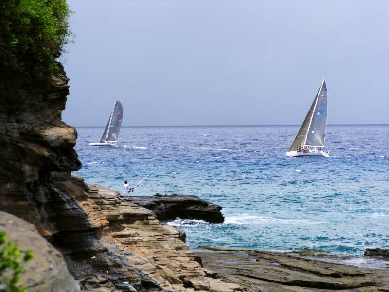 Boats rounding the point