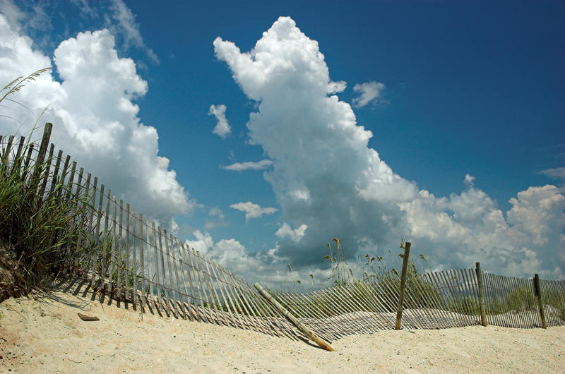 Clouds, Fence and Sand