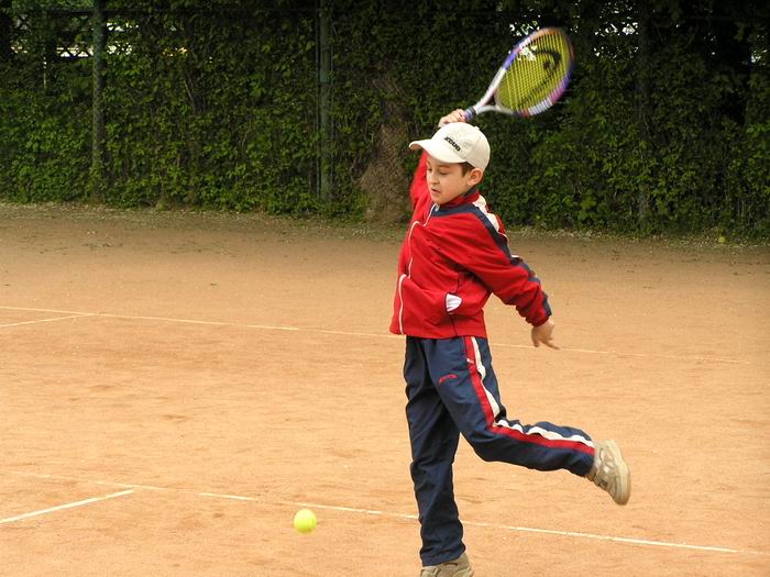 Bogdan playing tennis