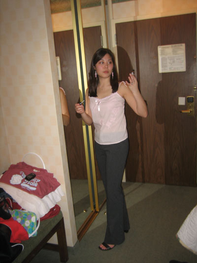 tina standing in front of jennifers magical changing closet