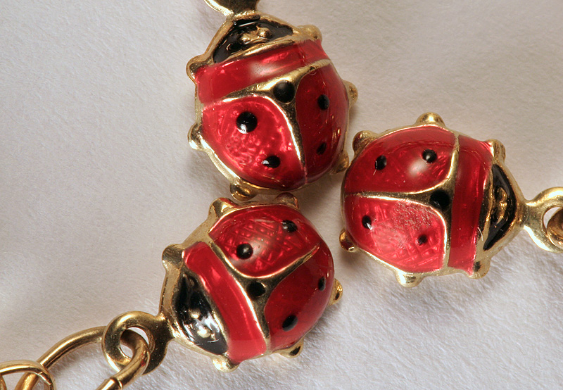 ladybug charms, by Christopher