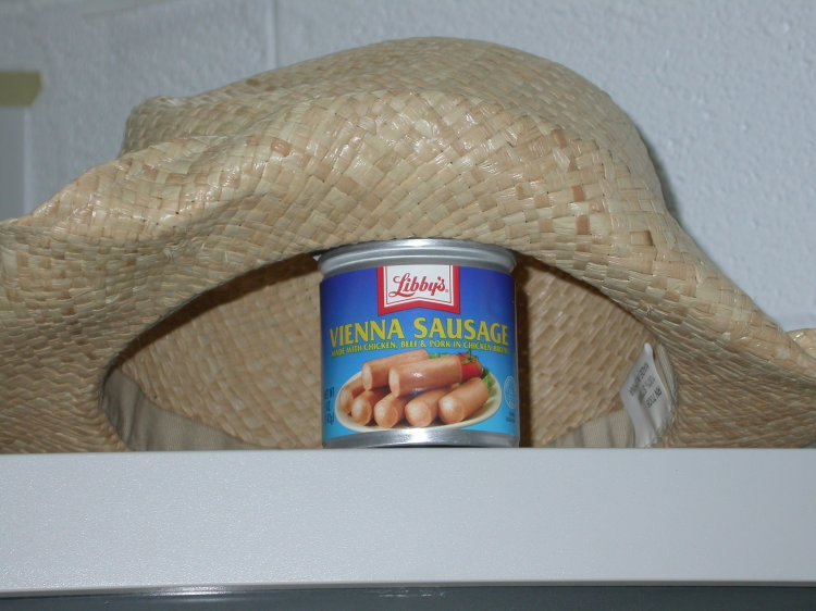 Petite Sausages wearing a hat
