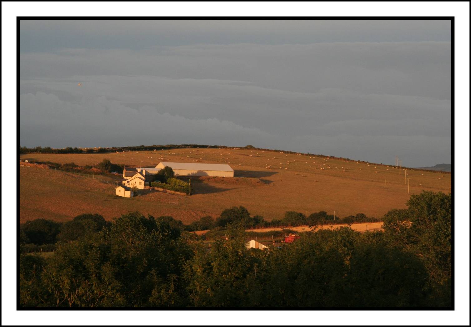View from our Devon holiday home patio - sunset time
