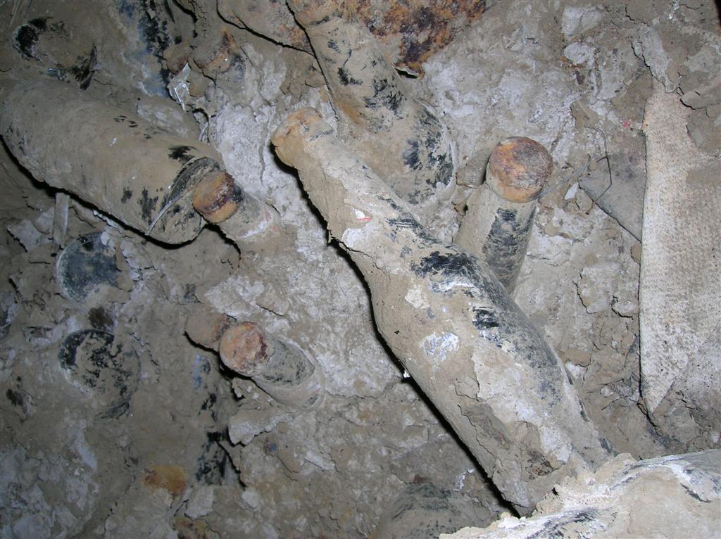 Cases of beer encased in mud