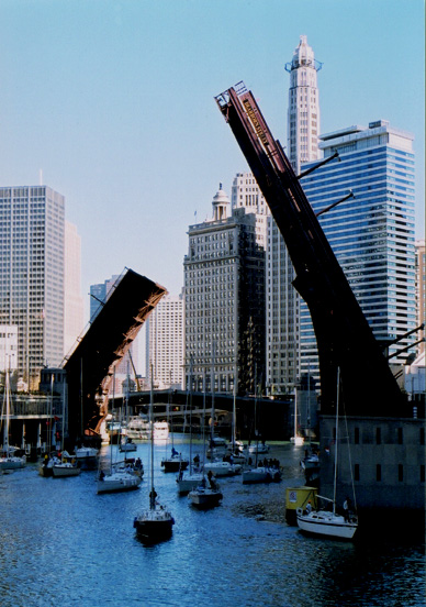 Sail Boats return to dry dock <BR>at the end of the season down the Chicago River